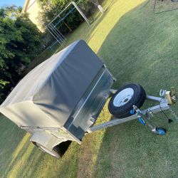2021 Hans 7 x 5 trailer with cages and vinyl cover 2021 Hans 7 x 5 trailer with cages and vinyl cover
